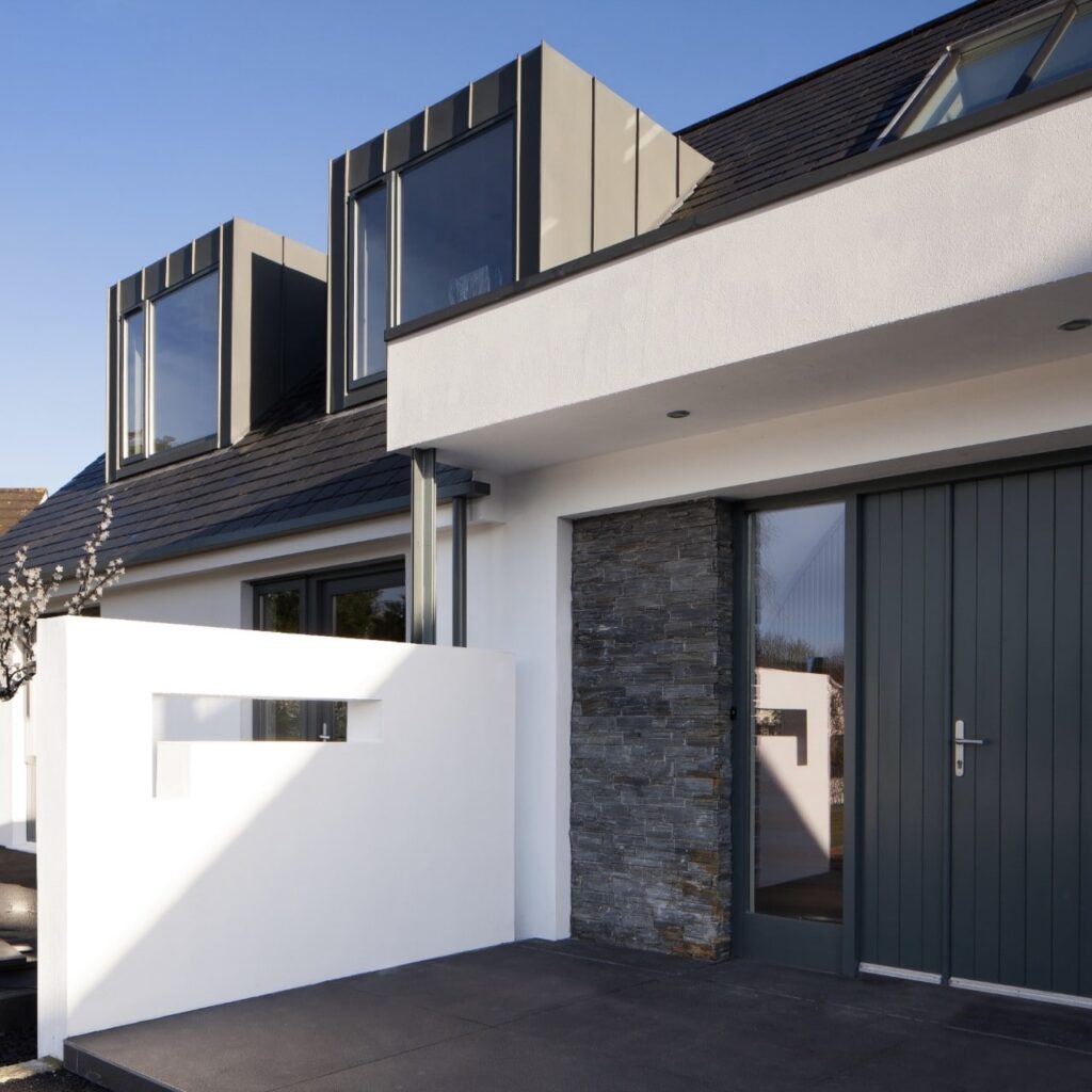 A modern home as seen from the front driveway