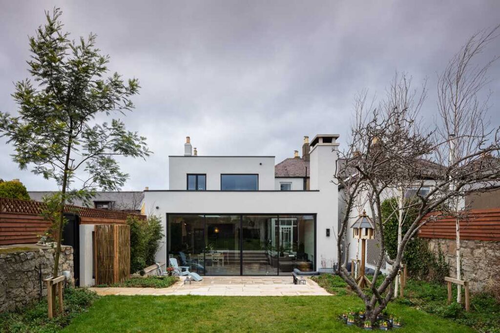 Contemporary rear extension of Edge House Sandycove with glazing to the garden