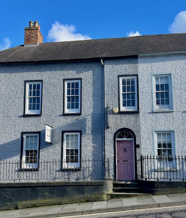 Street view of the Georgian terrace studio of McCann Moore, residential architects in Main Street Hillsborough County Down
